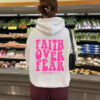Hooded long sleeved fleece sweatshirt with Faith Over Fear print