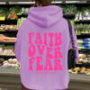 Hooded long sleeved fleece sweatshirt with Faith Over Fear print